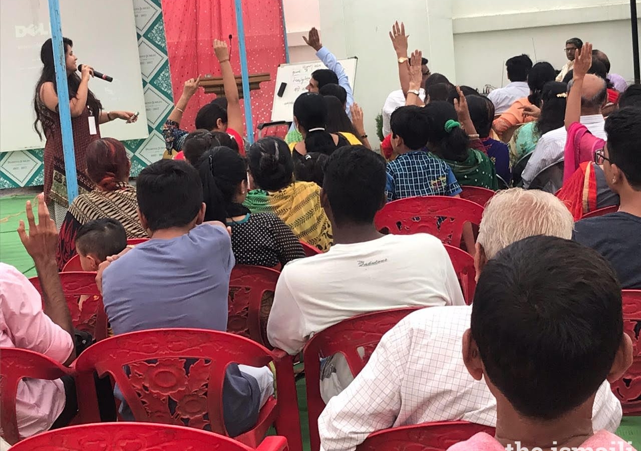 Members of the Jamat participating in the session