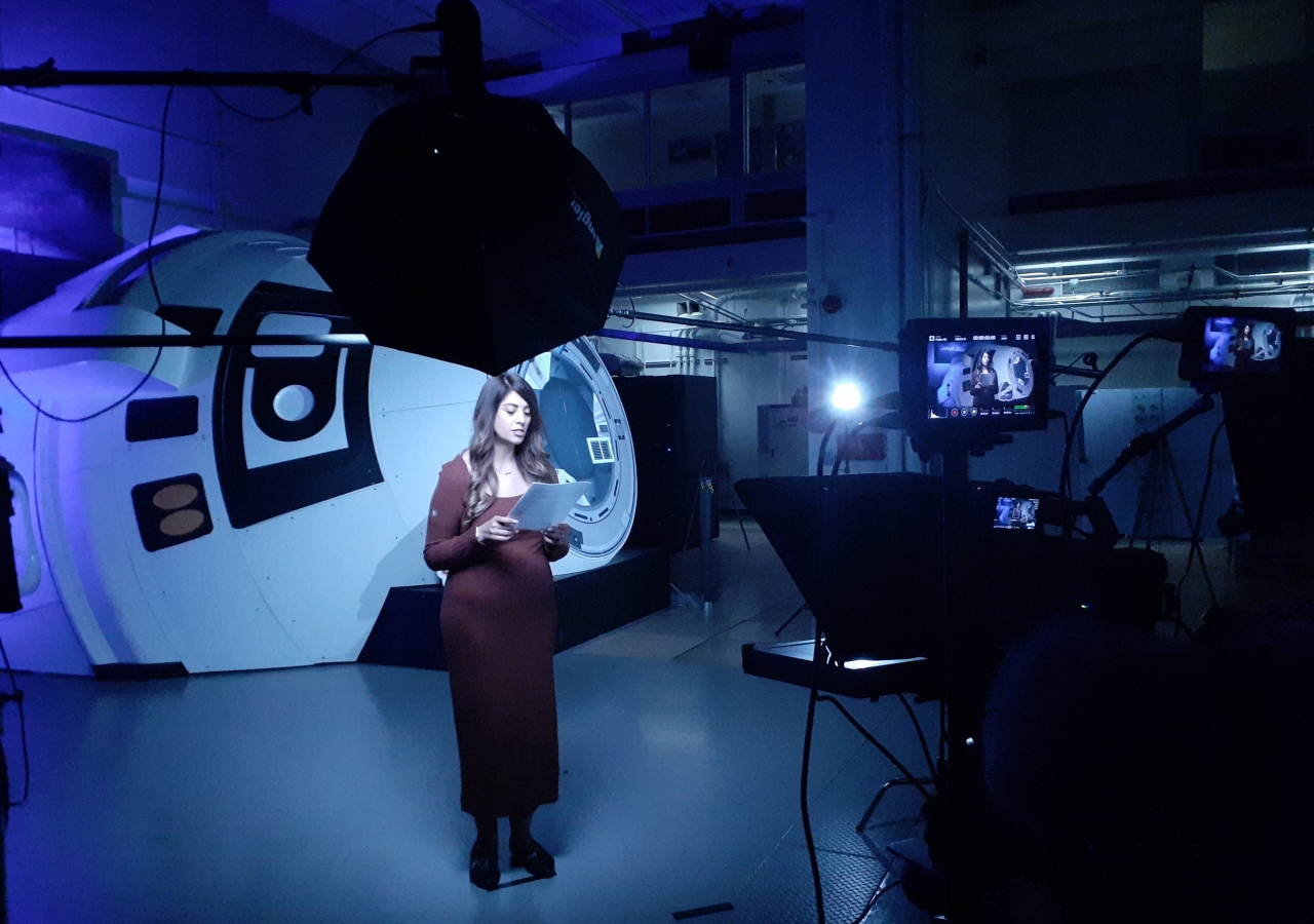 Recording a special episode of Space to Ground in front of Boeing's Starliner spacecraft at the Mission Simulation Facility in Johnson Space Center, as NASA prepares to launch its Boeing Crew Flight Test.