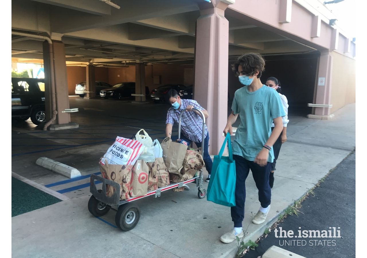 Jaden Amersi Anselmo delivers donated items to local organizations.