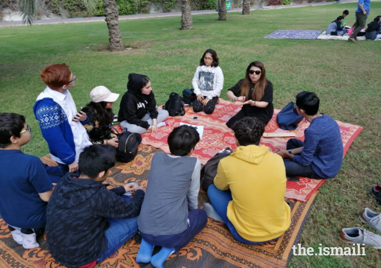 Young students from the Middle East Jamat discuss the beauty of merging architecture and nature. 