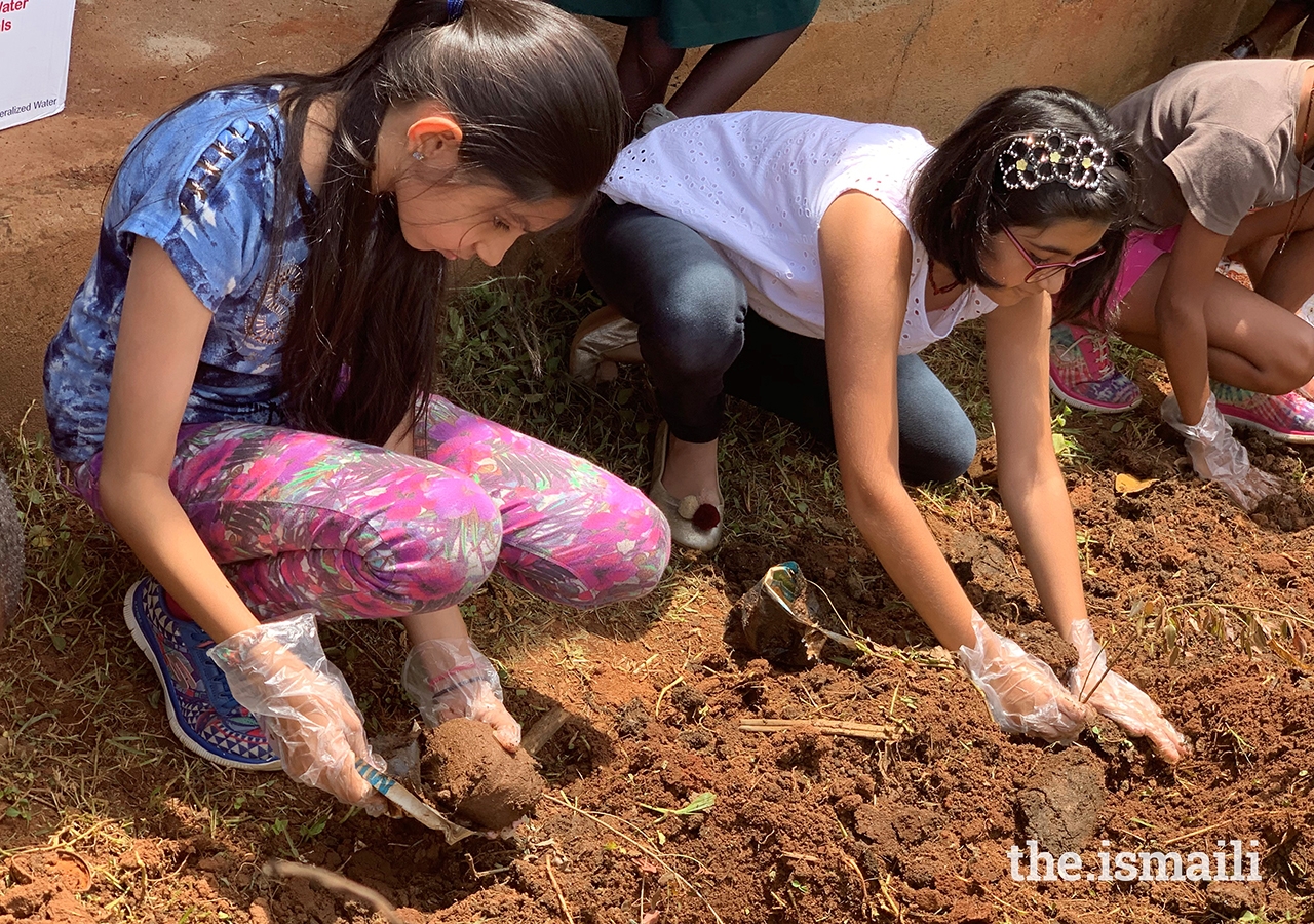 Volunteers at the school painting event planted over 100 plants and trees. All building materials, as well as the plants and the trees, were donated by members of the Jamat.