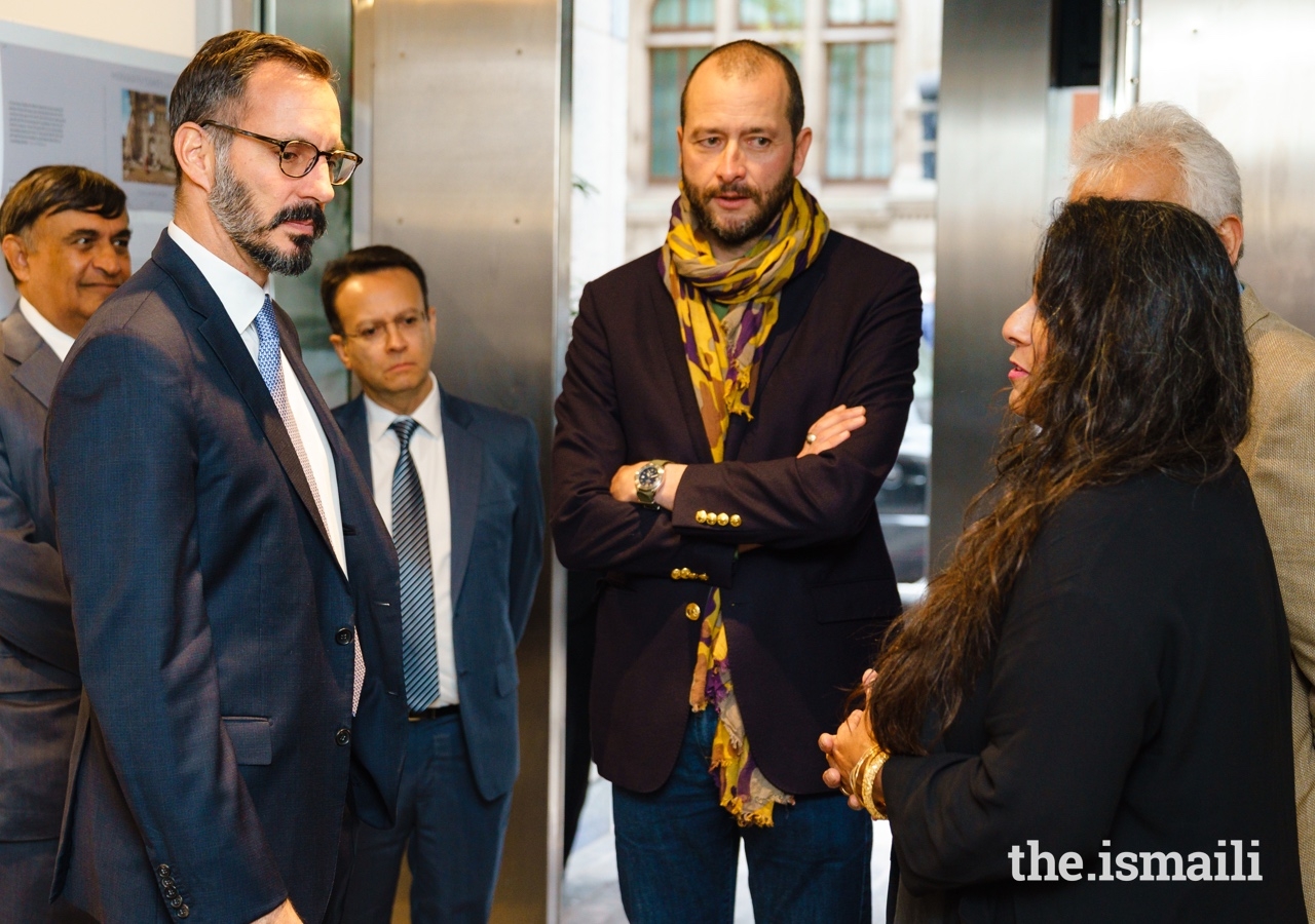 Prince Rahim in conversation with Curator Rozemin Keshvani as Guillaume Bonn looks on.