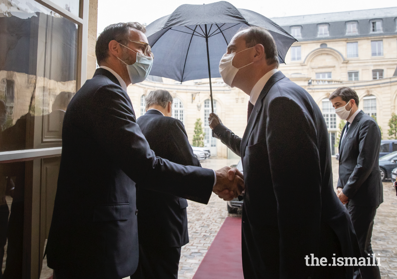 Prime Minister Jean Castex bids farewell to Prince Rahim after their meeting in Paris on 13 July 2021.