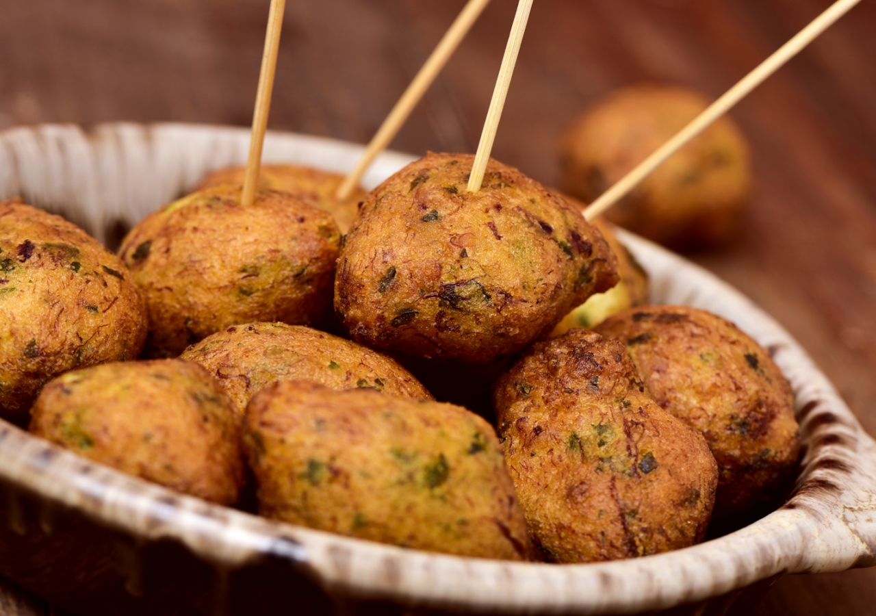 Fulfill your craving for fried food with these delicious Portuguese-style cod fritters.