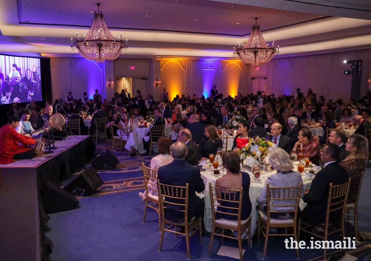 The audience enjoys a musical performance by Master Musicians of the Aga Khan Music Initiative, Homayoun Sakhi and Abbos Kosimov, who were joined by tabla player, Nitin Mitta.