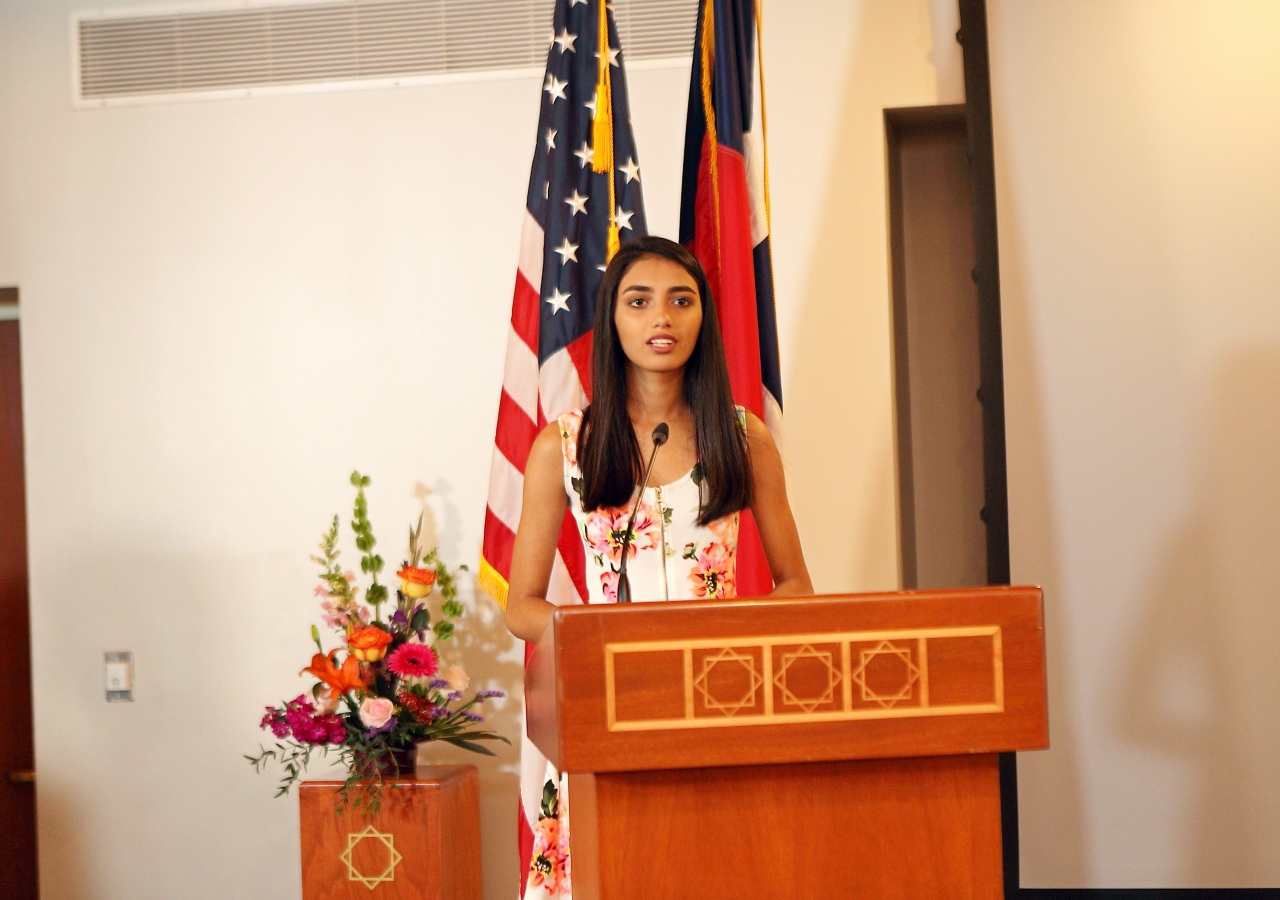 Chahaat Dhukka singing the National Anthem at the Eid Luncheon