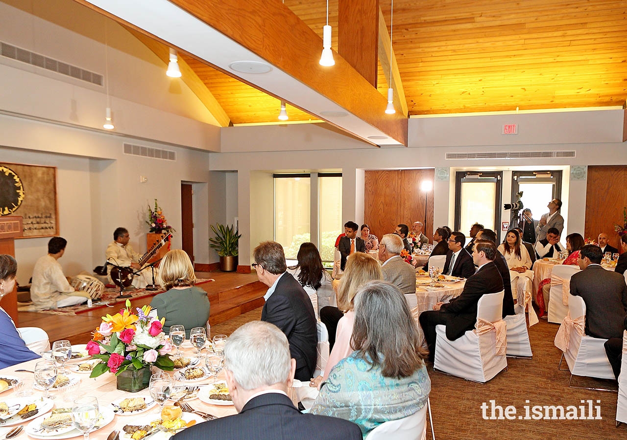 Sitar maestro Iklhaq Hussain, and table artist Shantilal Shah perform during the Eid ul-Fitr luncheon at the Ismaili Jamatkhana and Center, Houston.