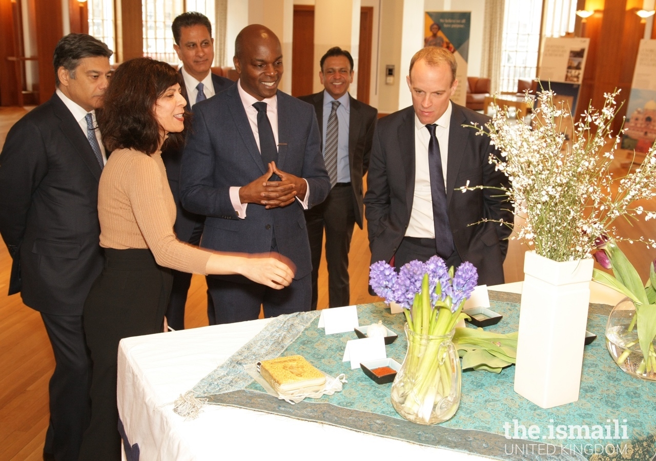 A traditional haft-seen spread is presented at the Ismaili Centre London to Dominic Raab, Secretary of State for Foreign and Commonwealth Affairs, and Shaun Bailey, Member of the London Assembly.