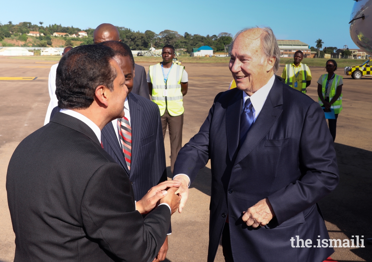 AKDN Resident Representative Amin Mawji greets Mawlana Hazar Imam.