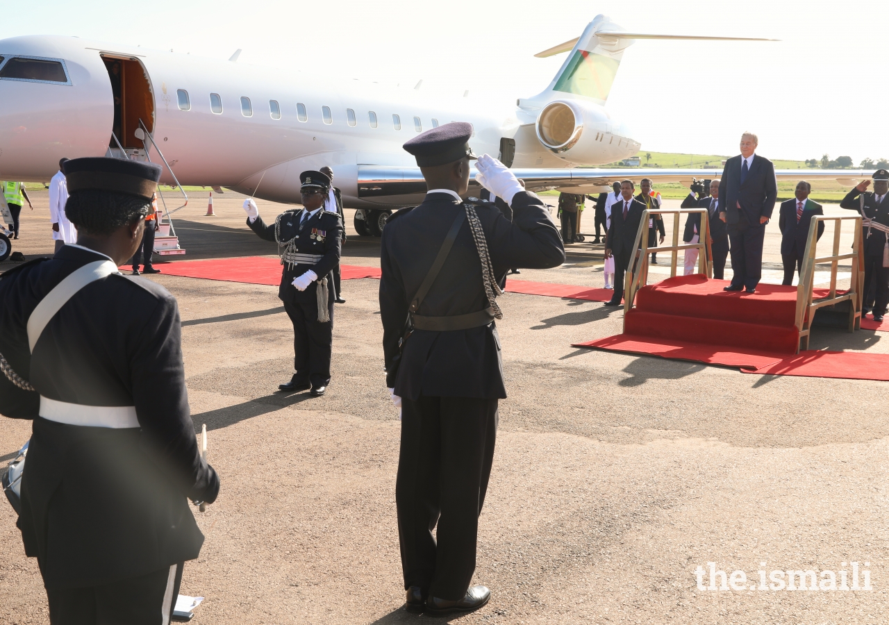 Mawlana Hazar Imam at Entebbe Airport as the Uganda Police Band plays the Nashid al Imamah and the Ugandan National Anthem.