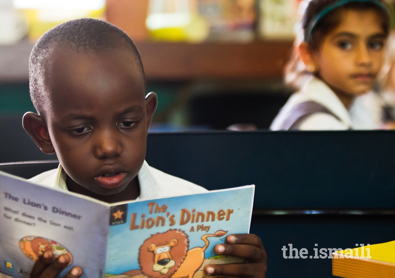 A student reading at the Aga Khan Academy Mombasa.