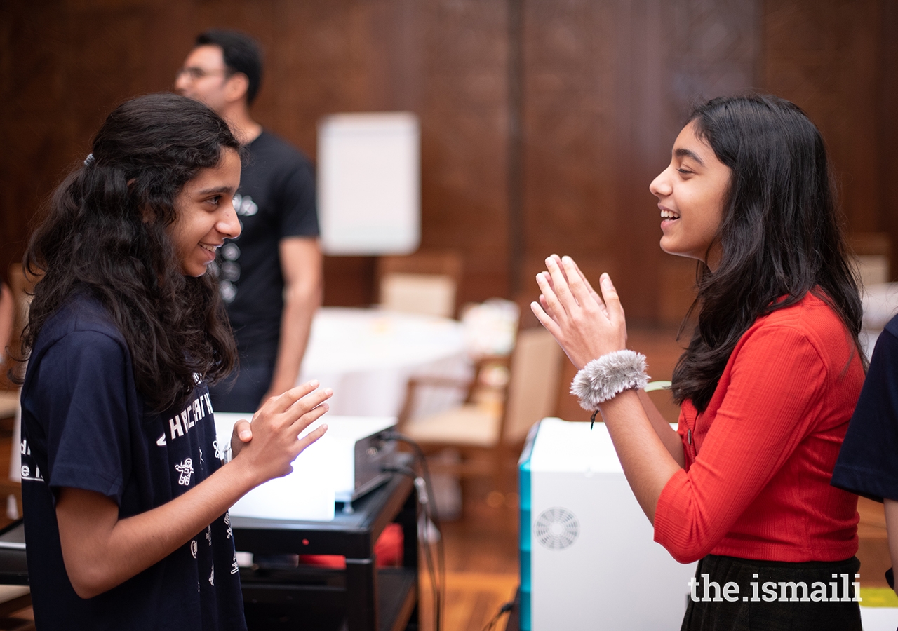 Participants share their thoughts and ideas during the Hackathon, held at the Ismaili Centre in Dubai.