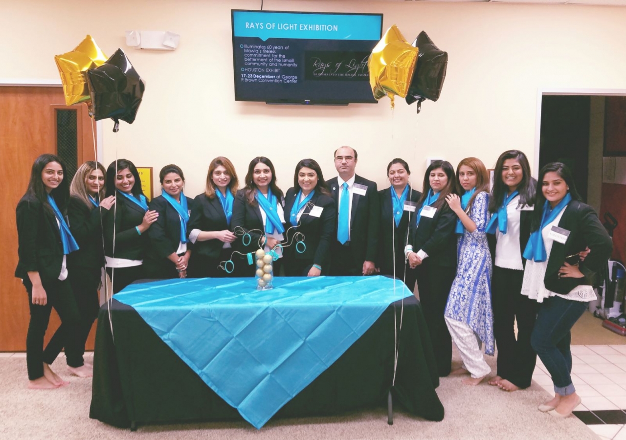 Volunteers at a Rays of Light exhibition in Houston, Texas