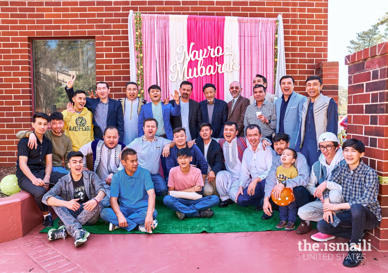 Family members and friends gather for a group photo at the Central Asian Jamat celebration