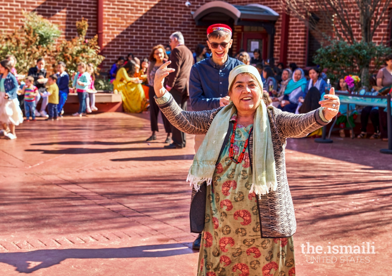 A Jamati member participating in dance festivities in celebration of our Central Asian heritage.