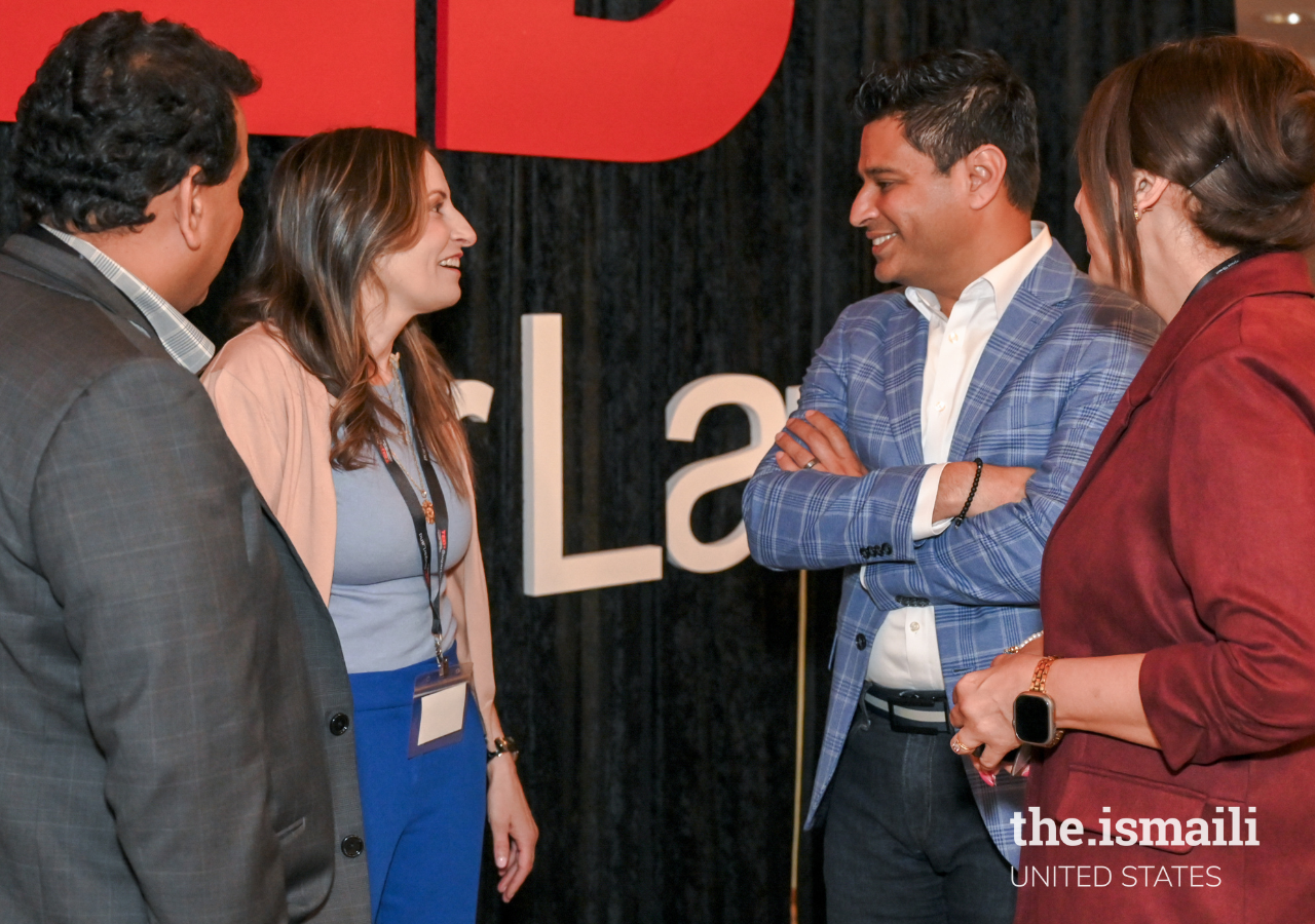 Faisal Momin, President of The Ismaili Council for The Southwestern USA, conversing with TEDx speaker Lidia Molinara, distinguished guest, and Waheeda Kara, member of the Ismaili Jamatkhana and Center programming