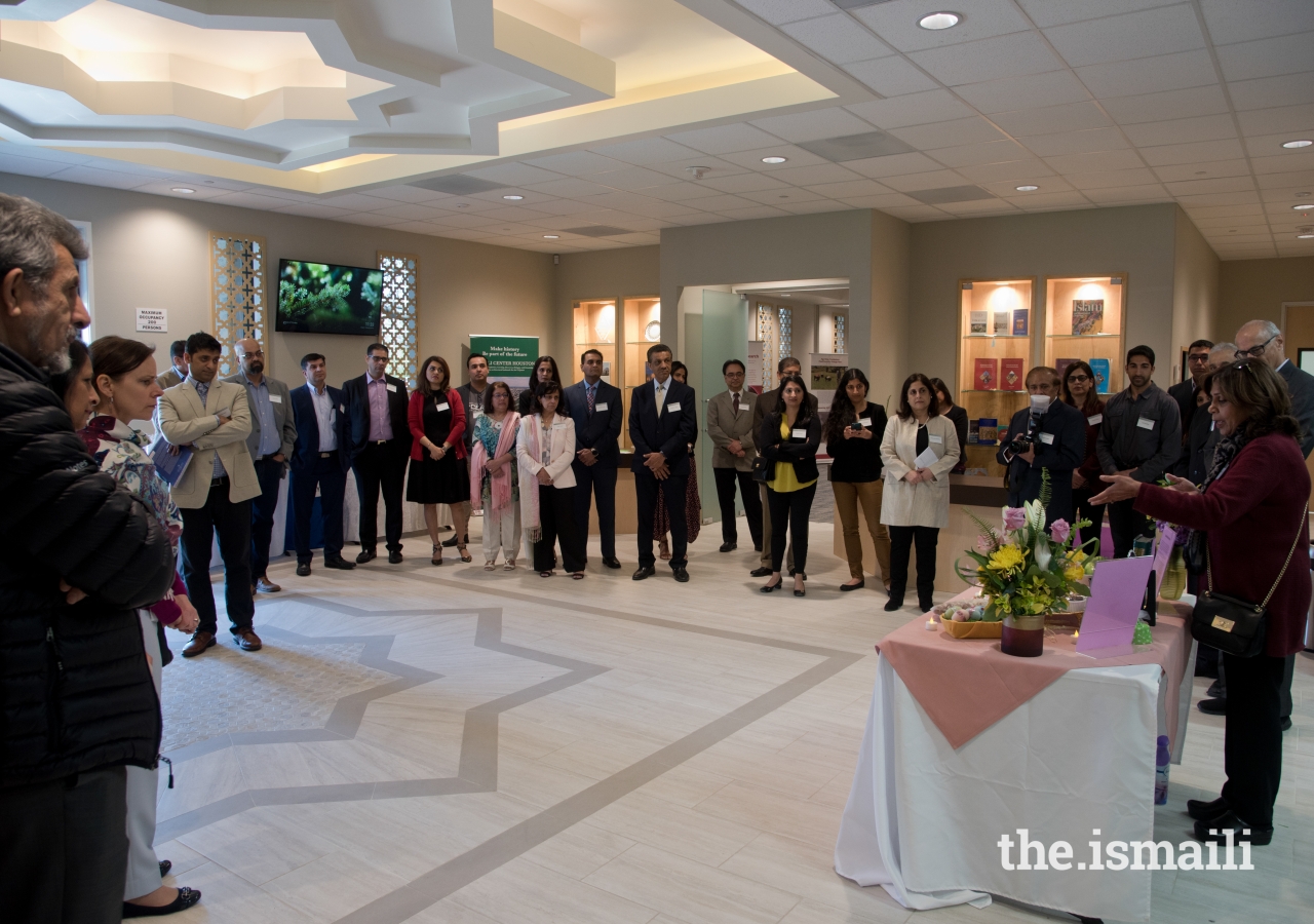 Guests listening to Haft Seen presentation.