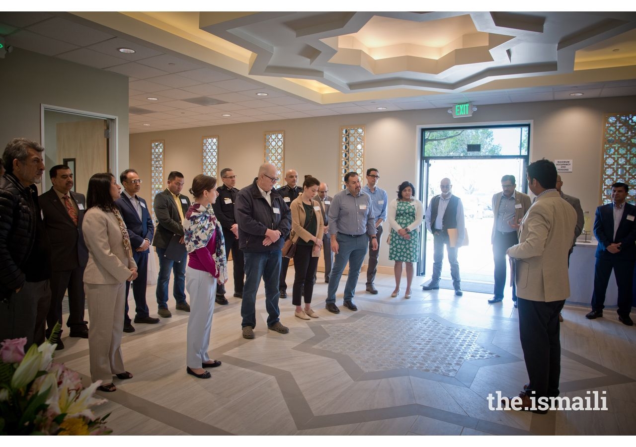 Asif Makhani giving a tour to the guests.