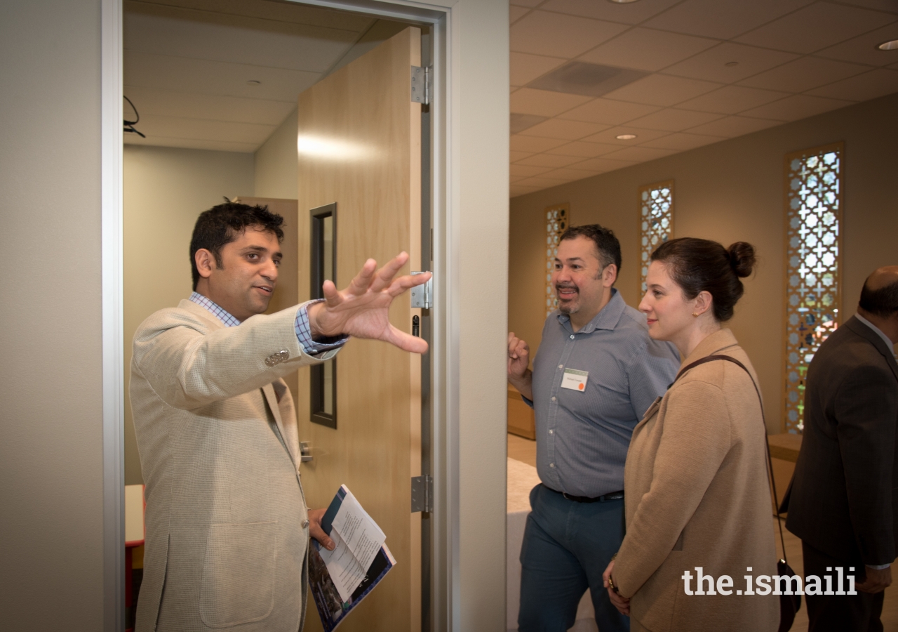 Adrienne Smith and Michael Fossati of the Milpitas Planning Division, with Asif Makhani.