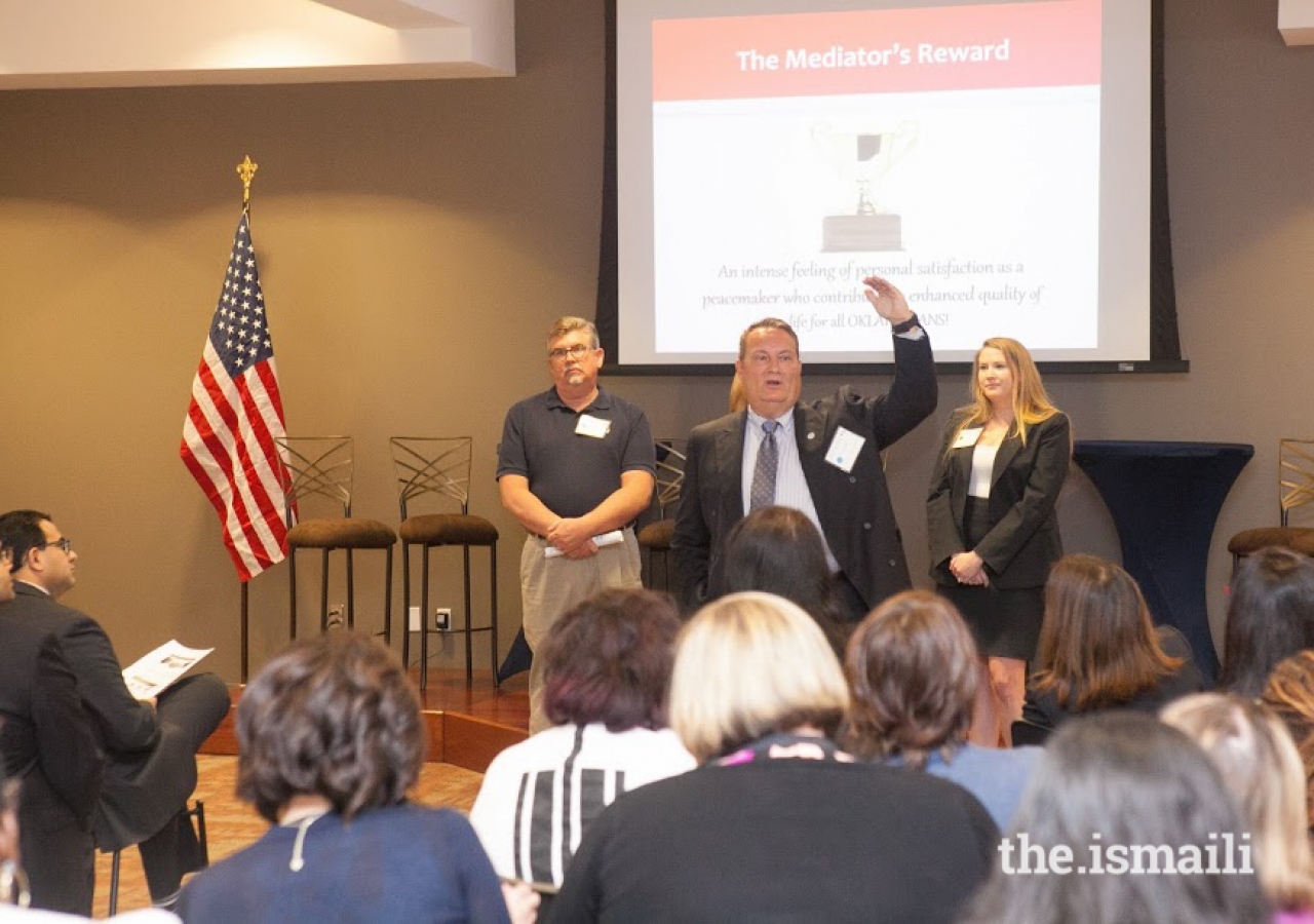 Mr. Phil Johnson, State Director of the Alternative Dispute Resolution System for the Supreme Court of Oklahoma (center) together with regional coordinators of Oklahoma's Alternative Dispute Resolution System provided an overview of Oklahoma's innovate mediation program.