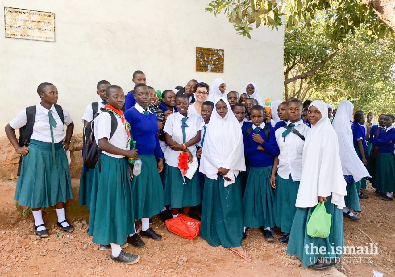 Shelmina with students of the Amahoro Secondary School in Mgaraganza.