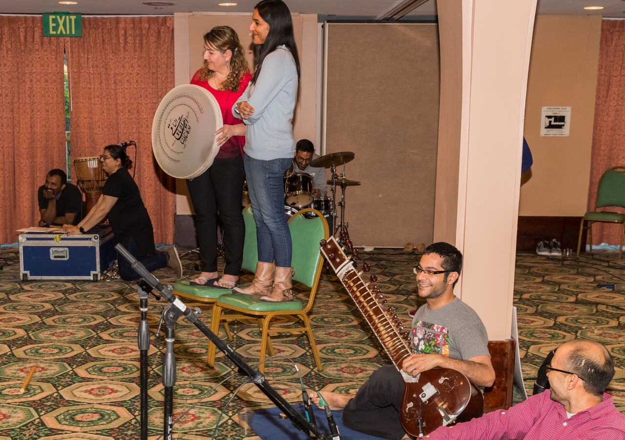 "Stories" instrumentalists, and Assistant Vocal Director/Singer/Actor Kanwal Malik Sumnani, sharing a jovial moment mid-rehearsal. 