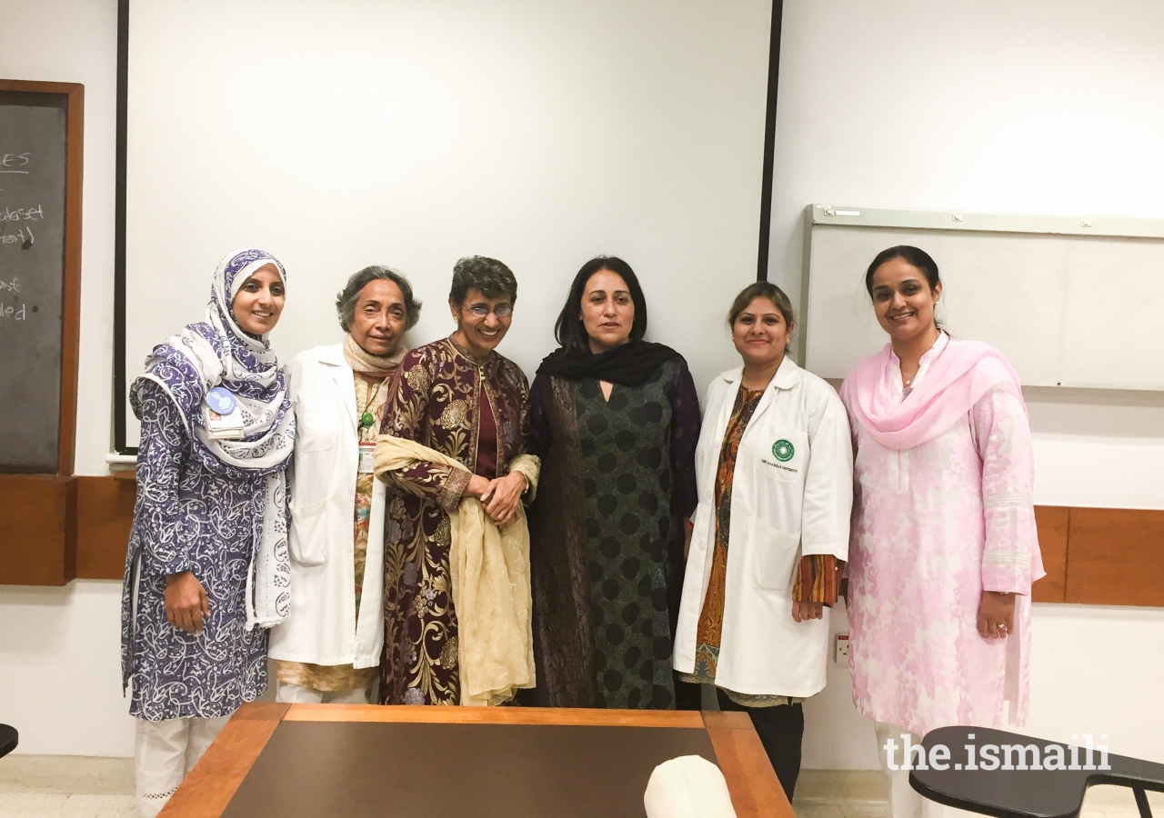 Dr. Anees Chagpar (3rd from left), and Dr. Farin Amersi (4th from left) pose for a photograph with medical students at the Aga Khan University, Karachi.