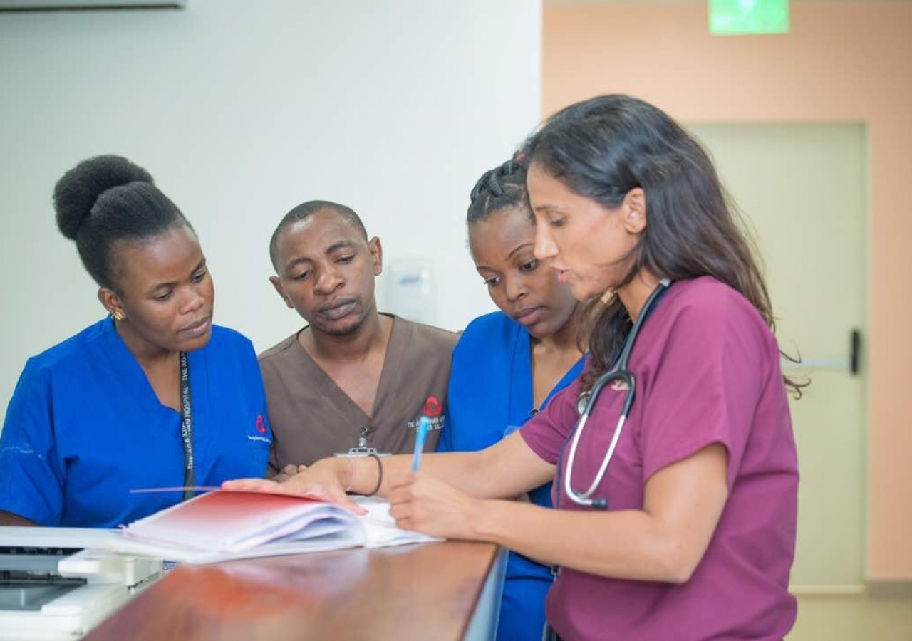 Dr. Lalani training nurses on how to read an ECG, so that heart attacks can be diagnosed rapidly and accurately.