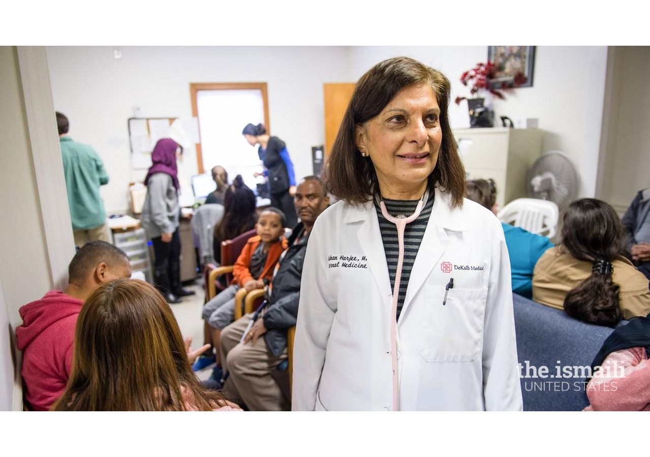 Dr. Gulshan Harjee with patients in her clinic.