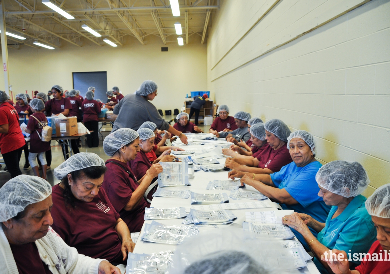  I-CERV volunteers and others packing nutritional packs in partnership with Feed My Starving Children, Chicago.