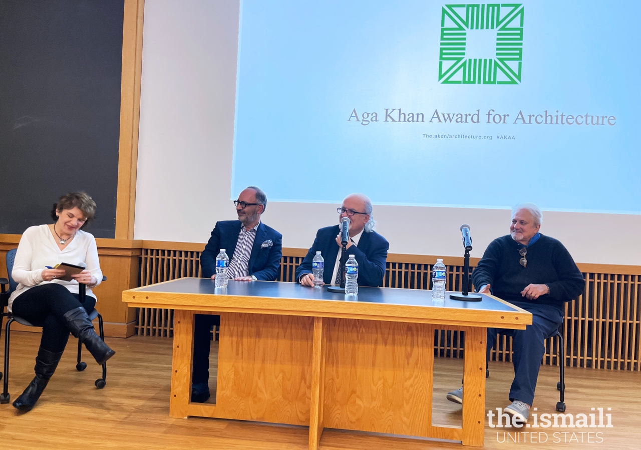 The three panelists with the moderator at the University of Maryland.