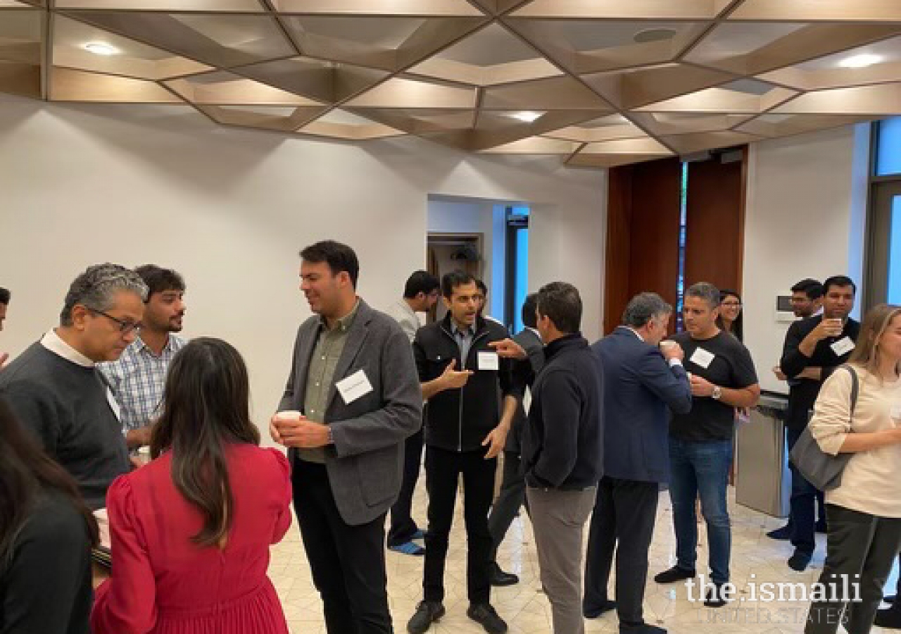 Salim Ramji engages with members of the finance community over afternoon high tea in the foyer of Manhattan Jamatkhana. 