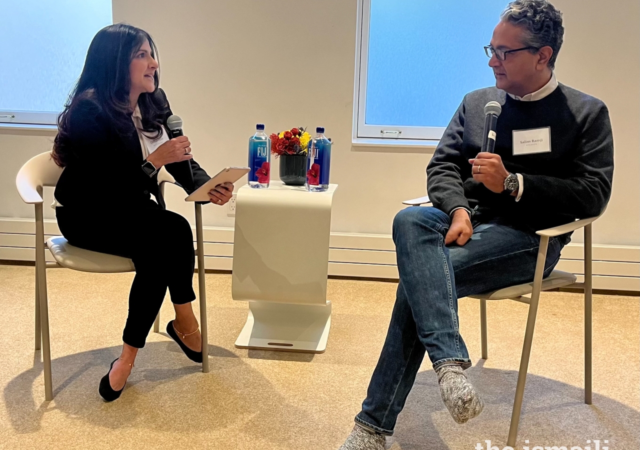 Moderator Gulzar Aziz in conversation with Salim Ramji, discussing the future of index investments in front of audience members from the New York Jamat.