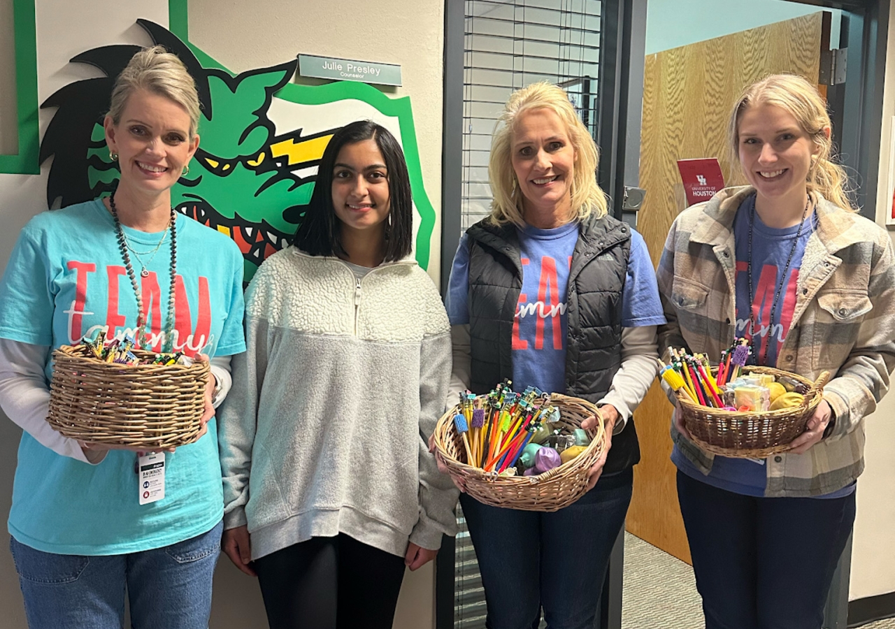 Zania delivering stress-relieving fidget objects to Carroll Senior High School counselors.