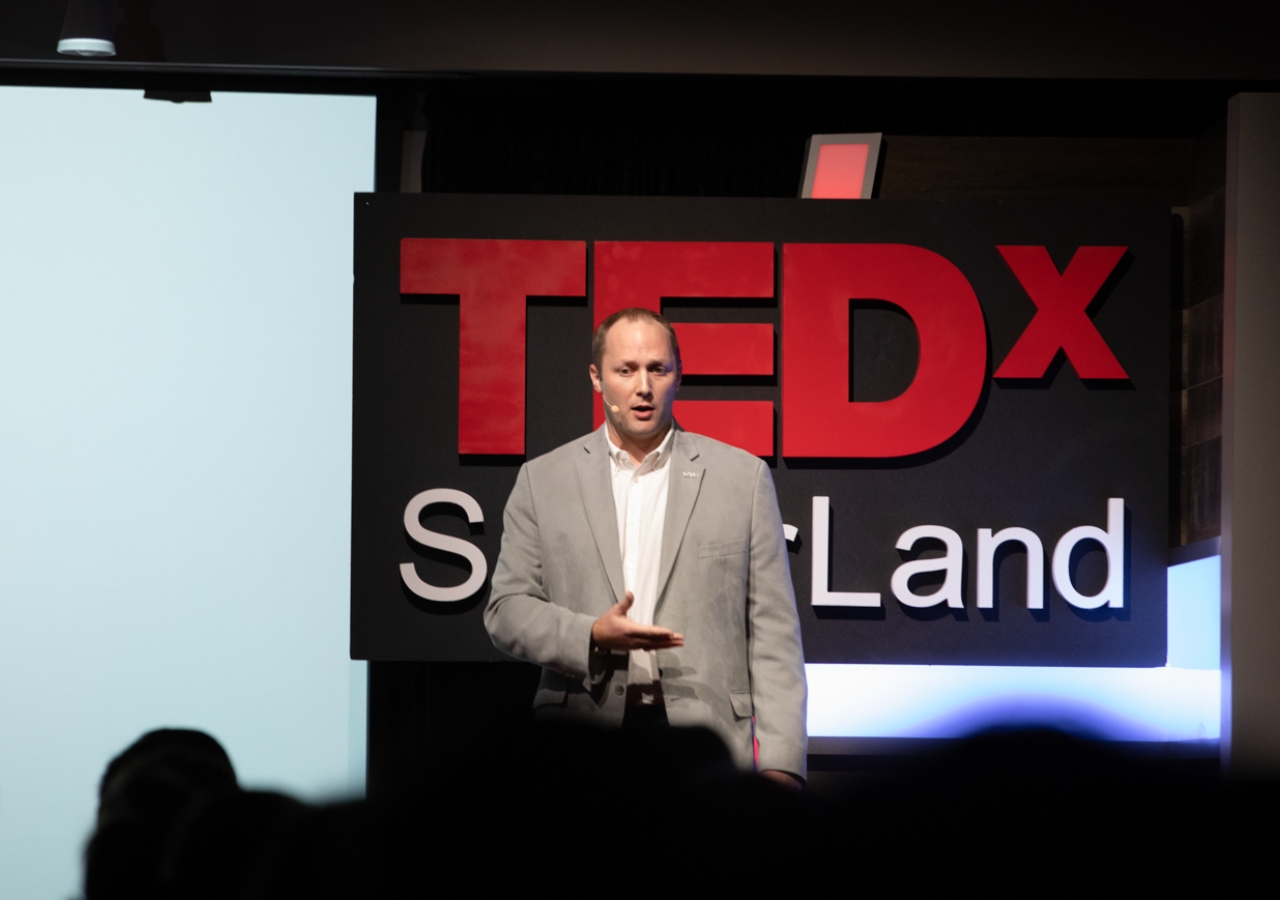 Kevin Doffing delivering his talk on How to Build a Community at TEDx SugarLand 2018.