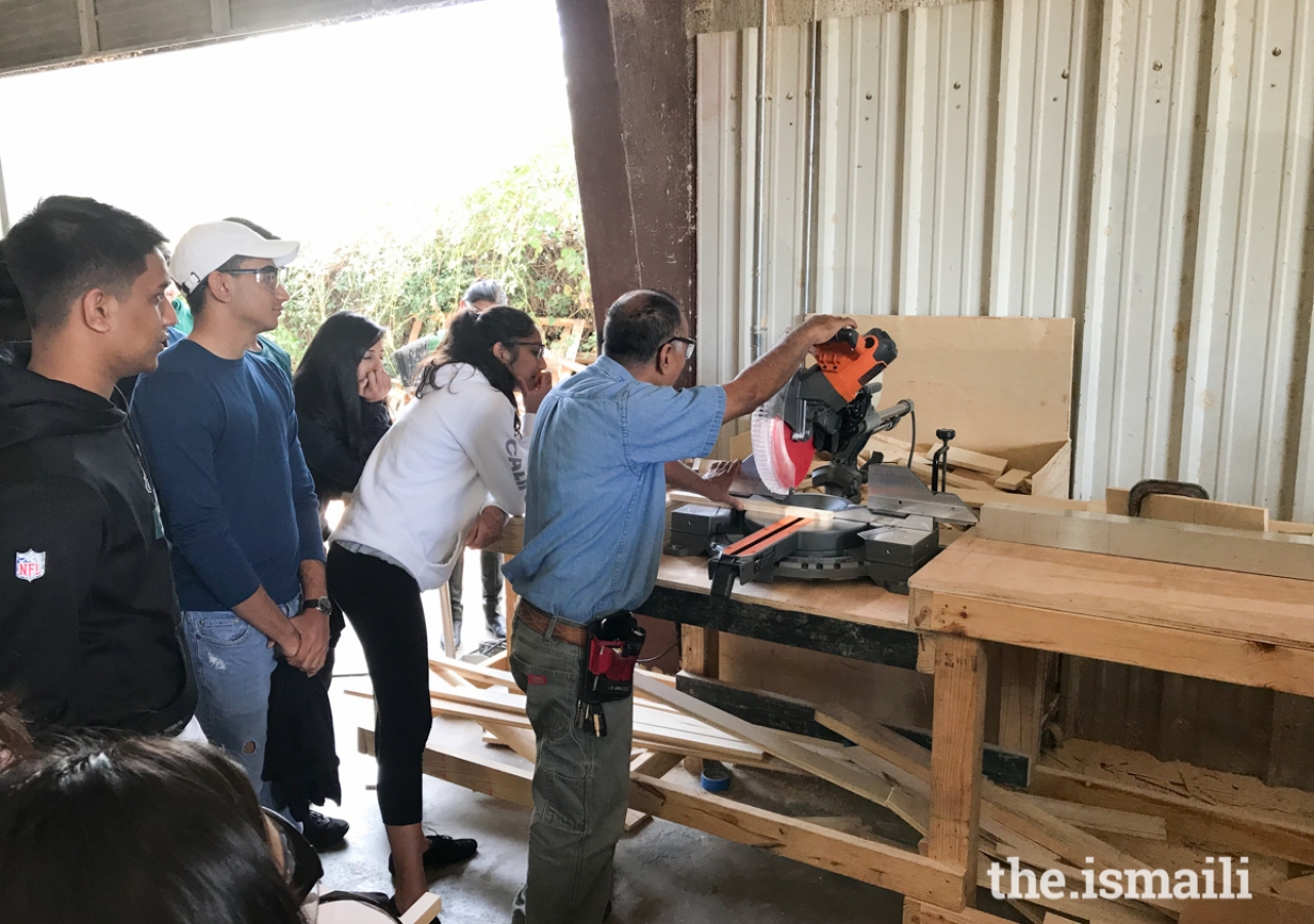 Workshop participants learning how to  use cutting tools properly.