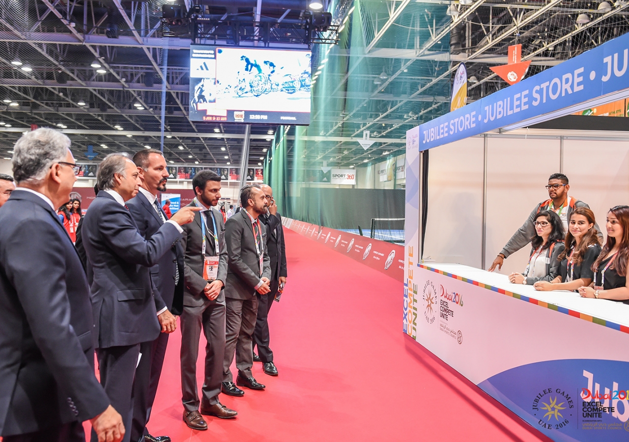 Prince Rahim accompanied by Jamati leaders view the Jubilee Store at Dubai Sports World at the 2016 Jubilee Games. JG/Aly Ramji