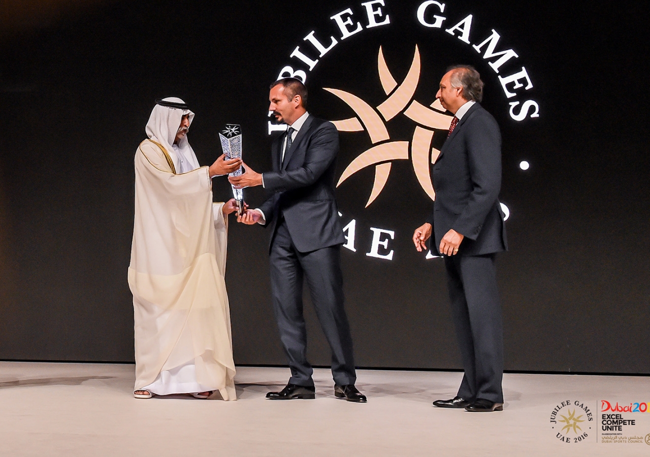 Prince Rahim presents Sheikh Nahyan with a momento of the 2016 Jubilee Games during the opening ceremony, as LIF Chairman Mahmoud Eboo looks on. JG / Aly Ramji