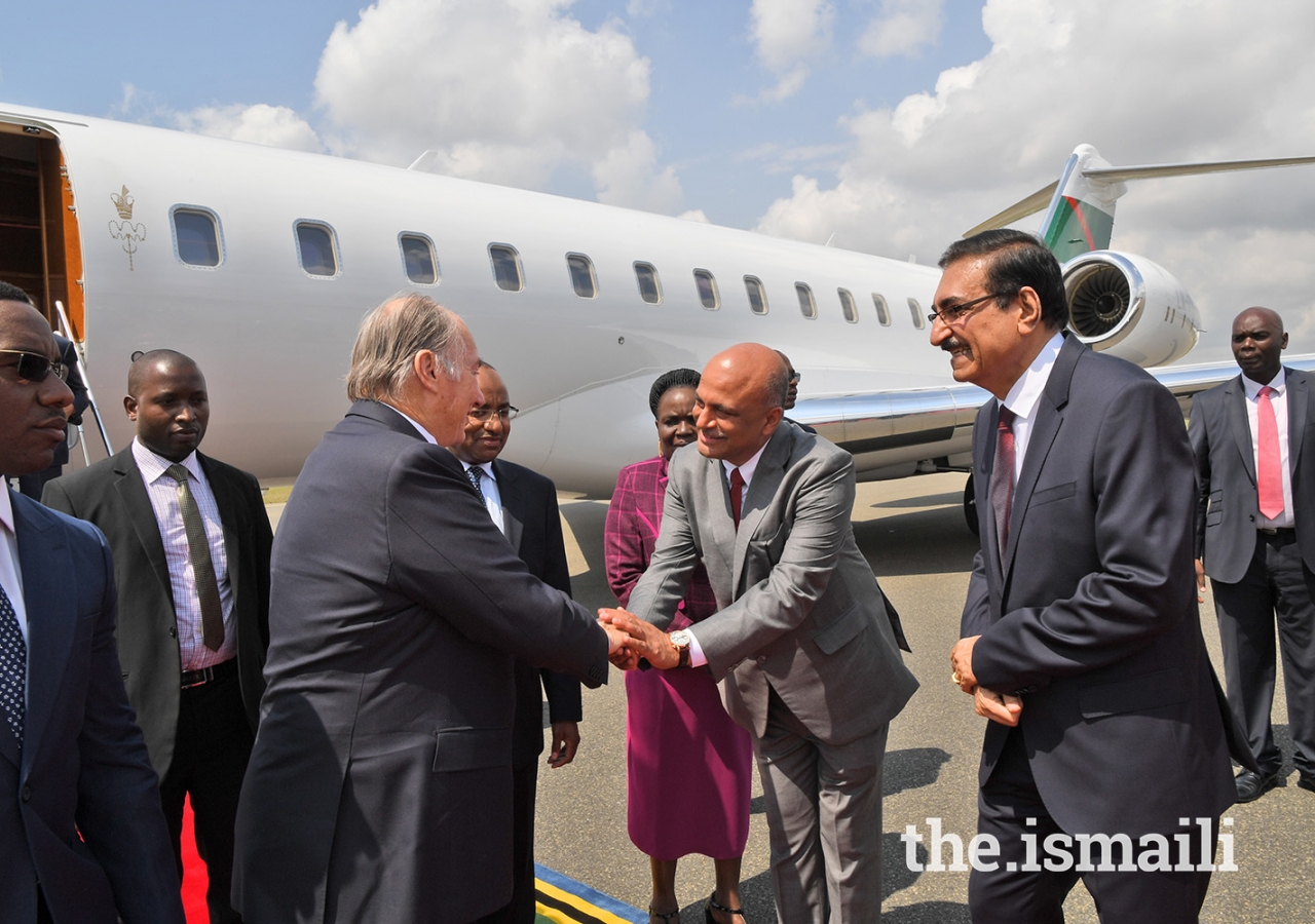 Mawlana Hazar Imam is greeted by Amin Lakhani President of the Ismaili Council for Tanzania.