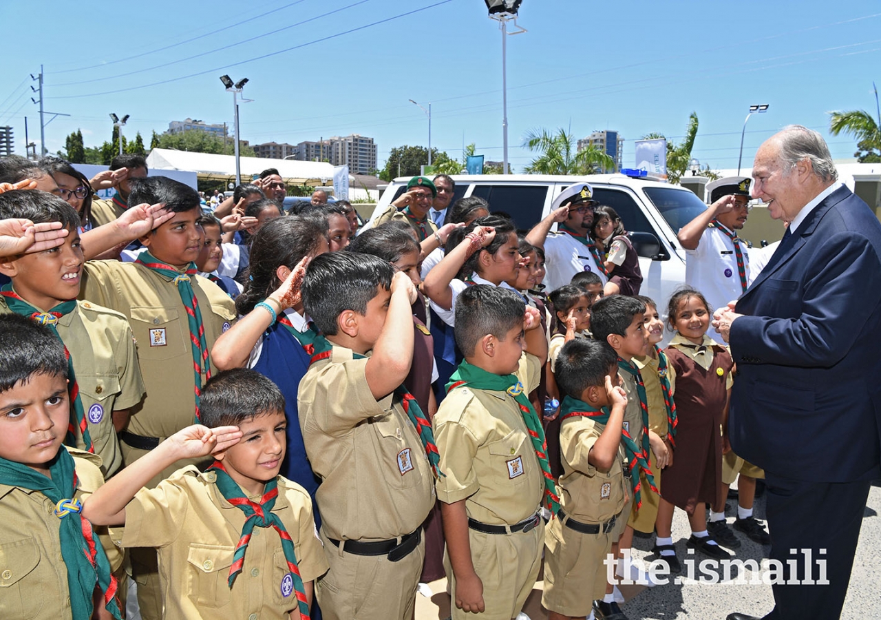 Mawlana Hazar Imam is greeted by Aga Khan Scouts and Guides, as he leaves Diamond Jubilee Hall after the Darbar.