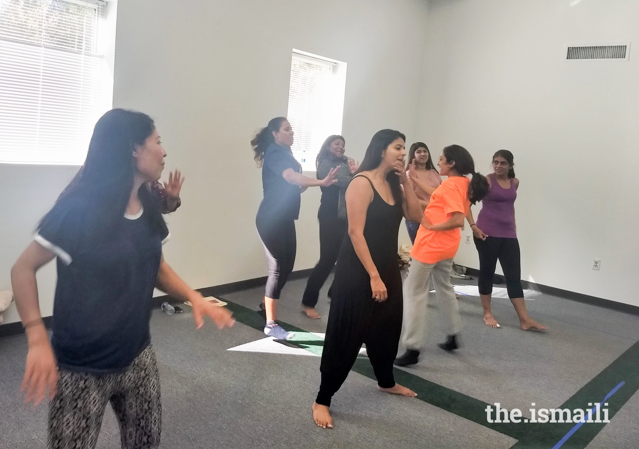 Jamati members participate in a Zumba class.