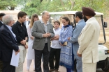 Mawlana Hazar Imam speaking with AKTC staff in 2015 after touring the Sundar Nursery and Batashewala complex with Prince Aly Muhammad, Princess Zahra and her children, Sara and Iliyan.