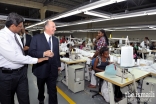 His Highness the Aga Khan takes a tour of Moztex garment manufacturing industry, which trains and employs women.