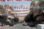 Ass’en Street in Salamieh decorated in green, red and golden colours to welcome Mawlana Hazar Imam.  