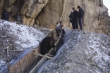 In high mountain areas of Badakhshan,Tajikistan, FOCUS works with local communities to build irrigation channels, pathways, and other structural mitigation projects to protect communities from the effects of avalanches, flooding, mud slides and rock falls