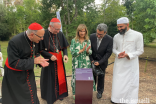 Yasmin Bhudarally, President of the Ismaili Council for Portugal, joins leaders of other faith communities to reveal a plaque at the Tropical Botanical Garden in Lisbon.