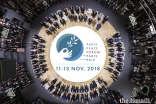 The official photograph of the participants at the opening session of the inaugural Paris Peace Forum.