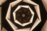 The ceiling light feature in the Prayer Hall consists of seven heptagonal (seven-sided) figures, visible in this close-up. 