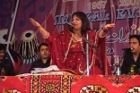 Shabnam Merali performs before a live audience. 