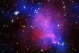 A composite of three separate images of the same galaxy cluster collision in one image.